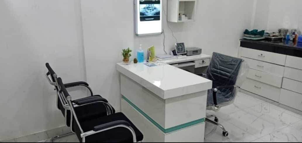 Reception and consultation desk at Vijay Dental and Orthodontic Clinic